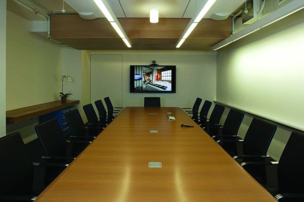 conference room with large screen tv on wall